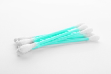 Photo of Plastic cotton swabs on white background. Hygienic accessory