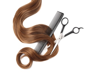 Photo of Light brown hair, comb and scissors on white background, top view. Hairdresser service