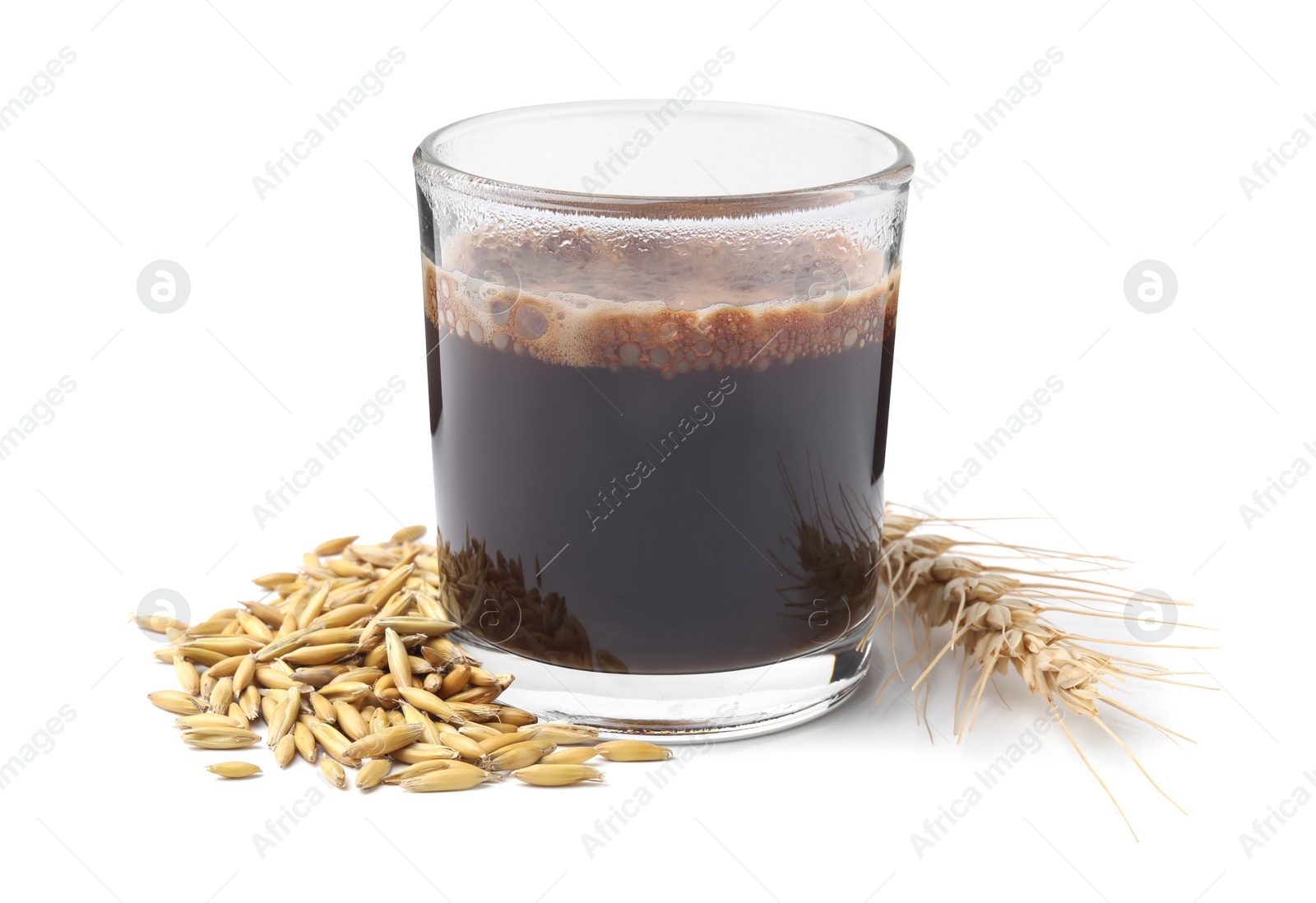 Photo of Cup of barley coffee, grains and spike isolated on white