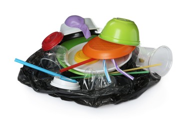 Photo of Pile of different plastic items on white background