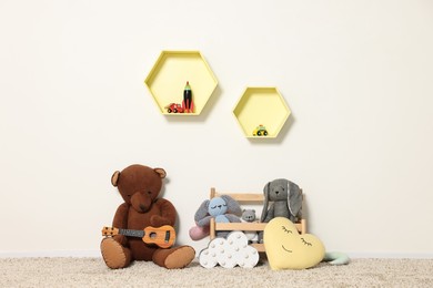 Soft toys and shelfs in beautiful children's room