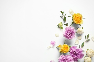 Photo of Flat lay composition with beautiful blooming flowers on white background