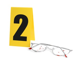 Photo of Bloody glasses and crime scene marker with number two isolated on white
