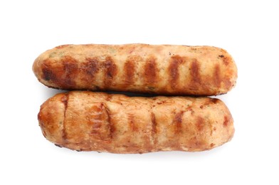 Photo of Tasty fresh grilled sausages isolated on white, top view