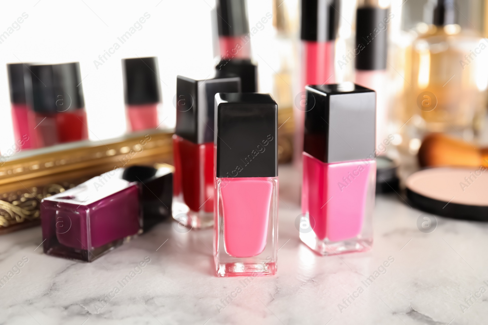 Photo of Bottles of nail polish on dressing table