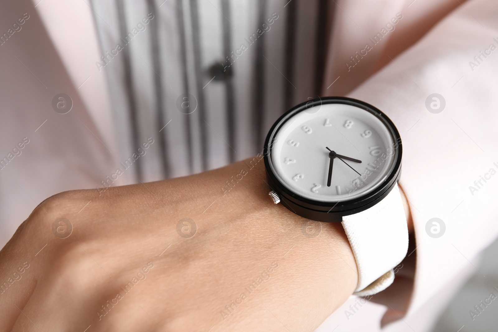 Photo of Businesswoman with stylish wrist watch, closeup. Time management