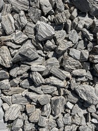 Photo of Many grey stones as background, top view
