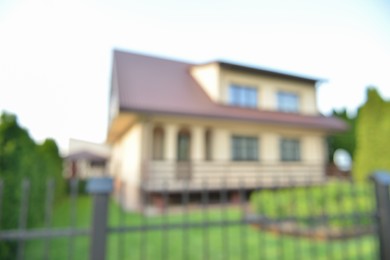 Blurred view of modern house and beautiful garden