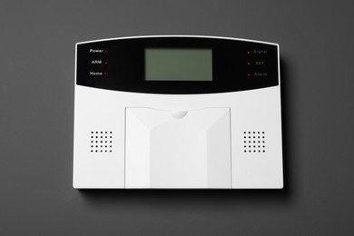 Home security alarm system on gray wall