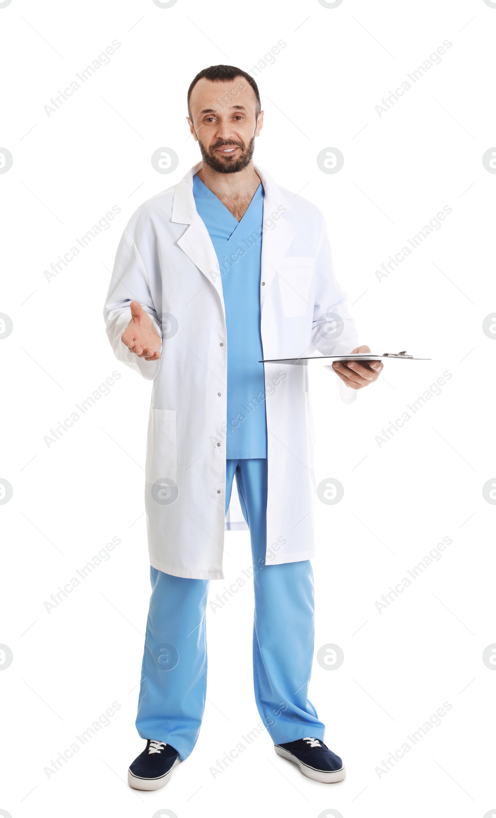 Photo of Full length portrait of male doctor with clipboard isolated on white. Medical staff