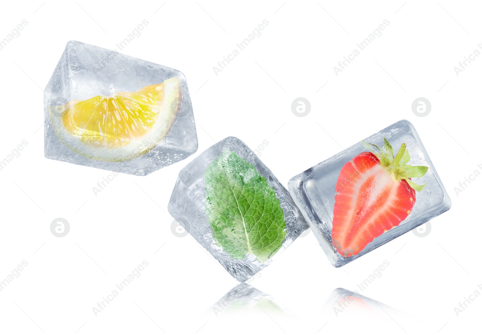 Image of Strawberry, mint leaf and slice of lemon on white background