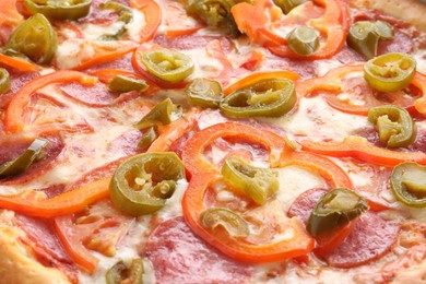 Photo of Delicious hot pizza Diablo as background, closeup