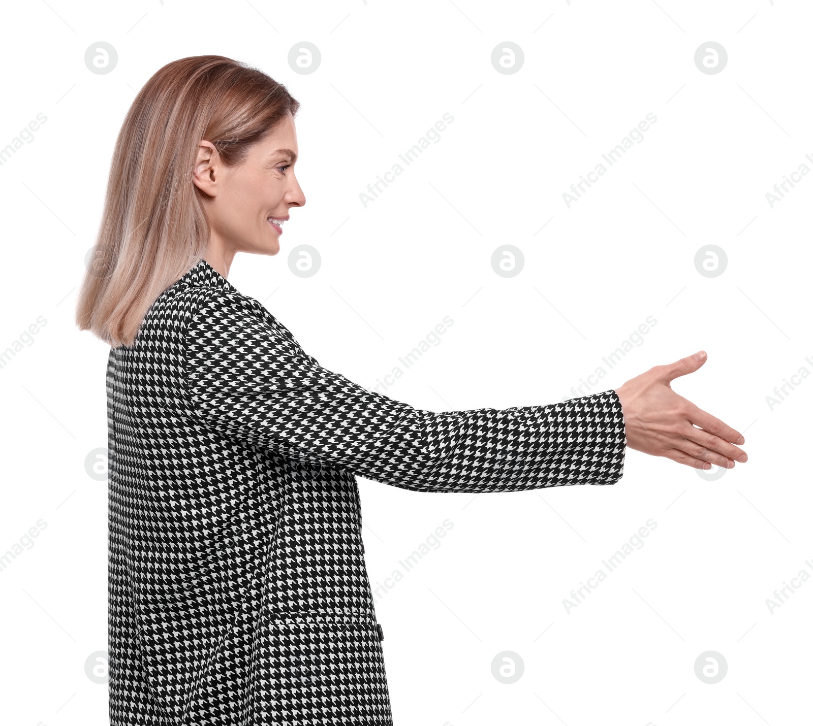 Photo of Beautiful happy businesswoman in suit giving handshake on white background