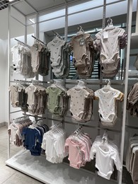 WARSAW, POLAND - JULY 17, 2022: Fashion store display with baby clothes in shopping mall
