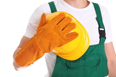 Photo of Male industrial worker in uniform on white background, closeup. Safety equipment