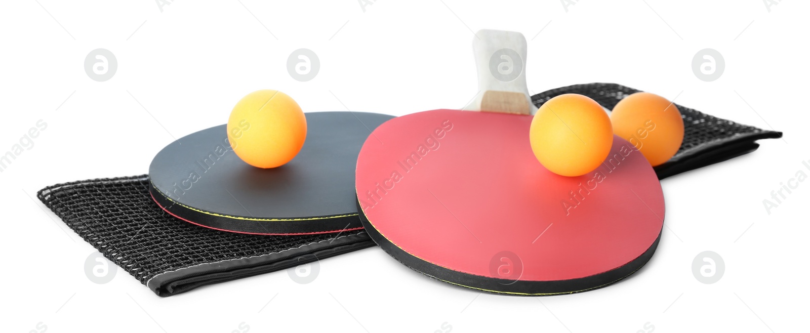 Photo of Ping pong rackets, net and balls isolated on white