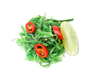 Photo of Tasty seaweed salad isolated on white, top view