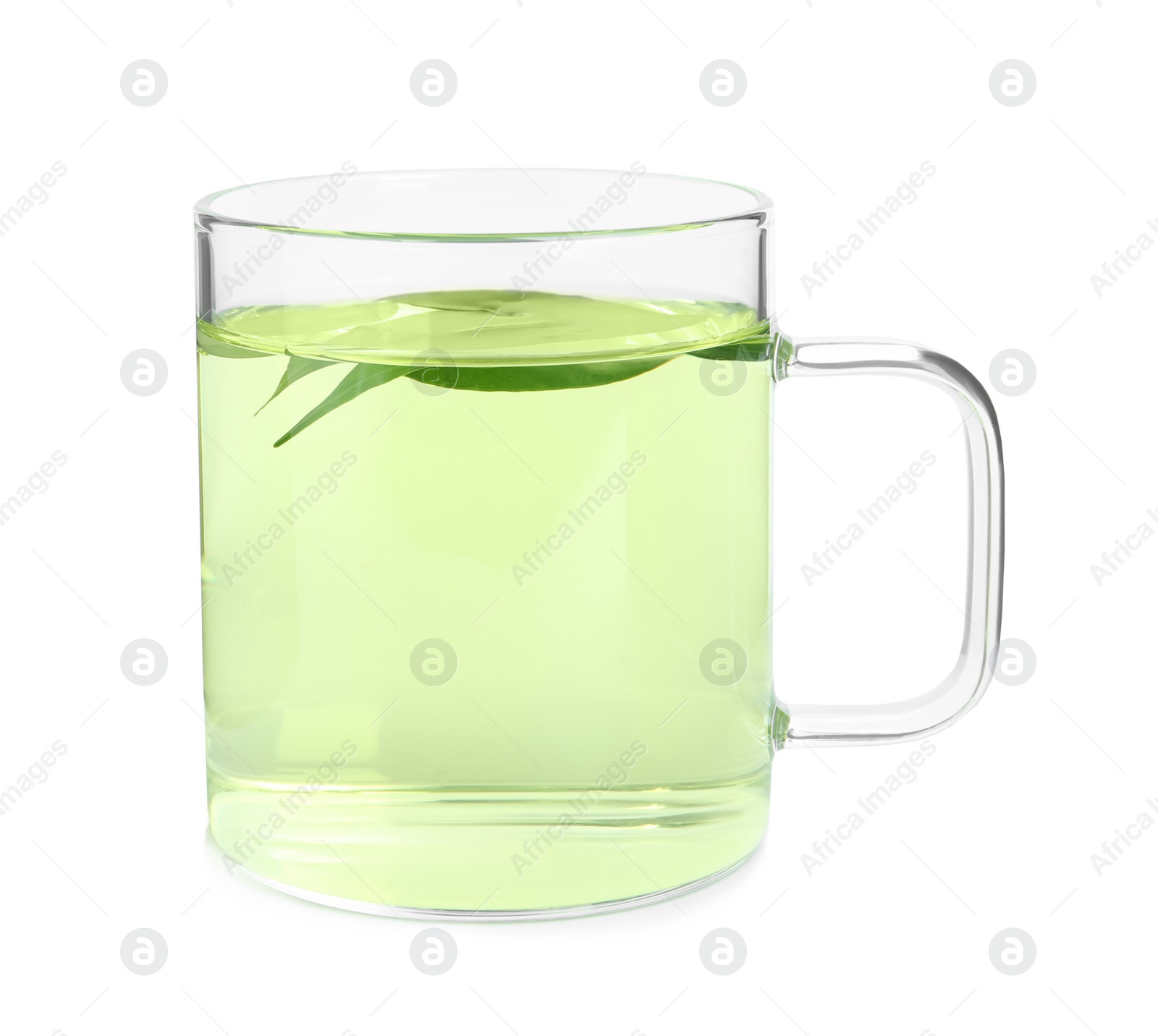 Photo of Cup of aromatic green tea with leaves isolated on white