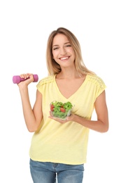 Happy slim woman with salad and dumbbell on white background. Weight loss diet