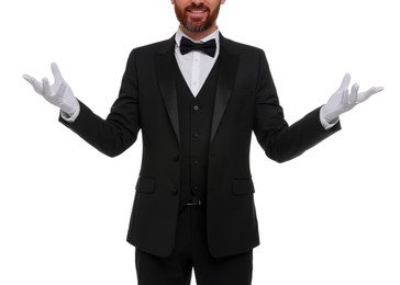 Photo of Magician in suit on white background, closeup