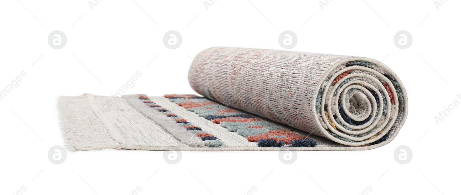 Photo of Rolled carpet with pattern on white background. Interior element