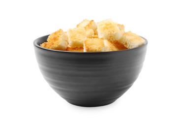 Photo of Delicious crispy croutons in bowl on white background