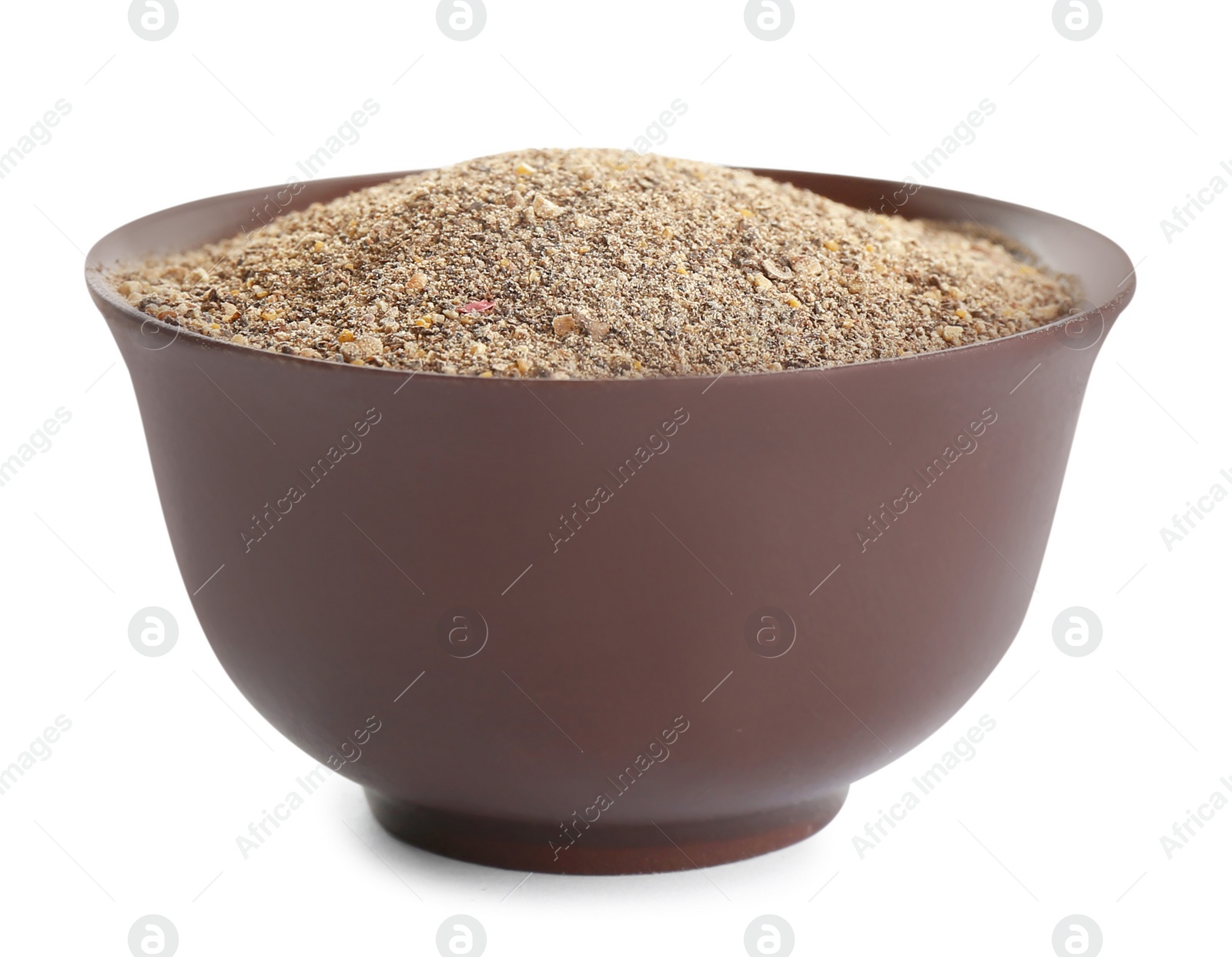 Photo of Bowl of ground black pepper isolated on white