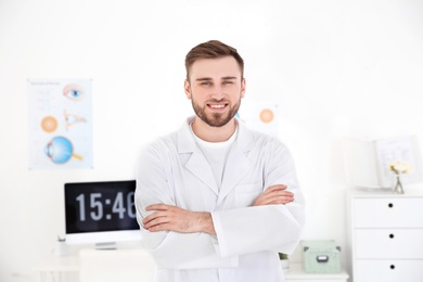 Photo of Young male ophthalmologist in clinic