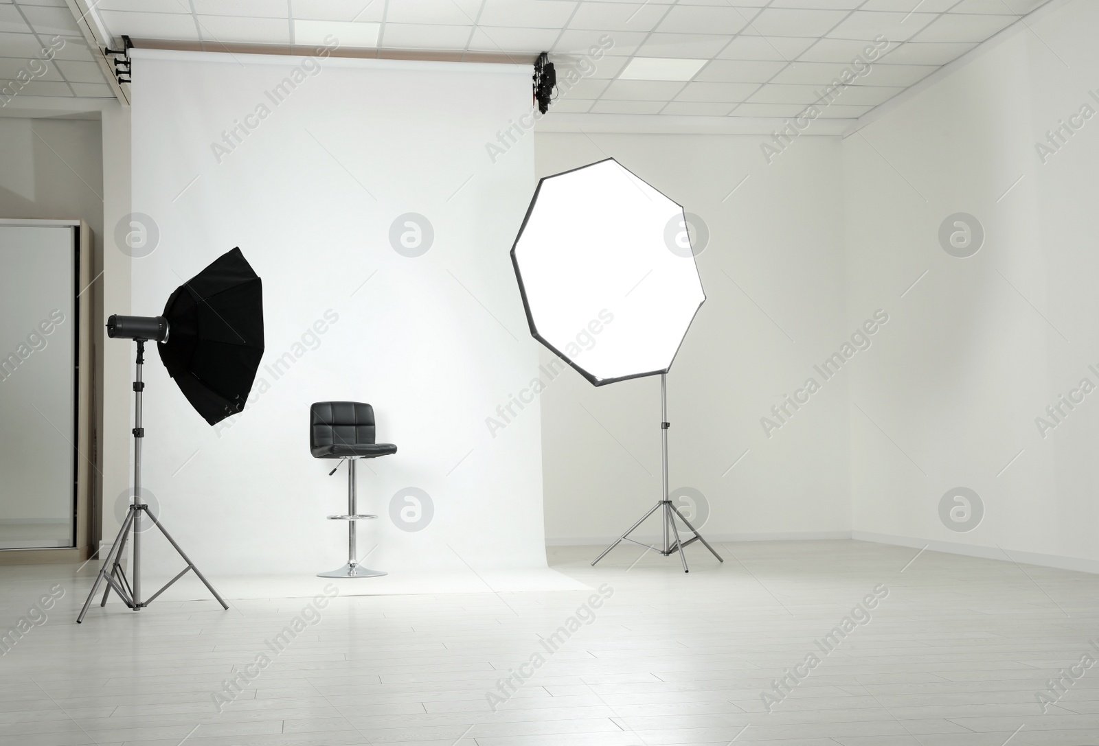 Photo of Photo studio interior with set of professional equipment