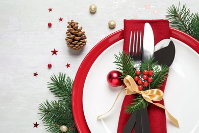 Photo of Christmas table setting on white background, flat lay