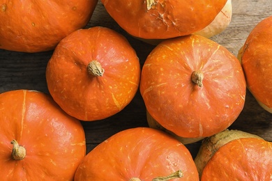 Many orange pumpkins as background, closeup. Autumn holidays