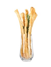 Delicious grissini and rosemary in glass on white background