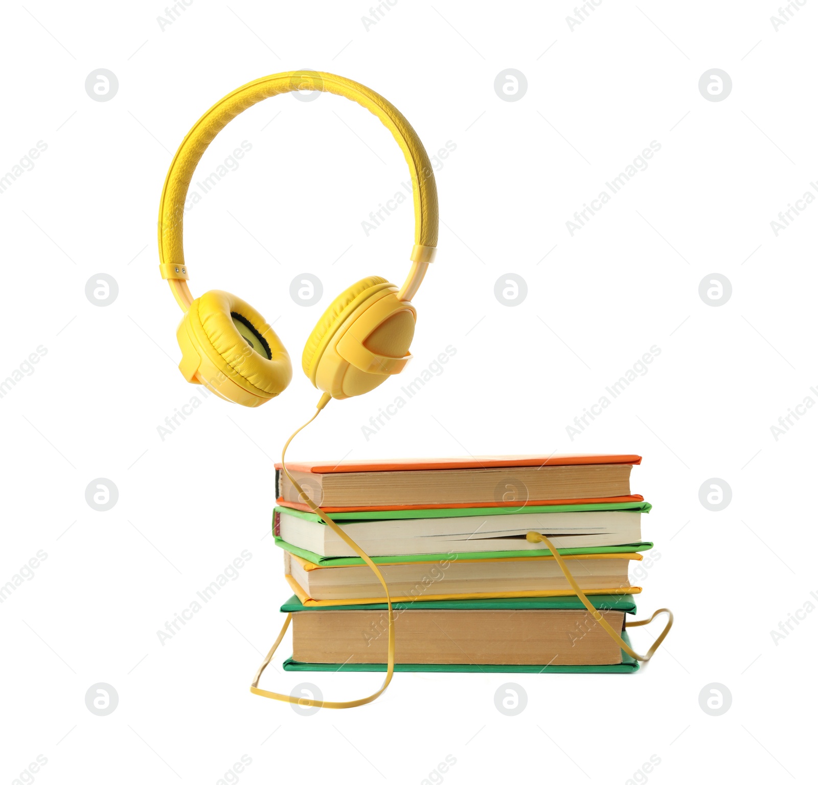 Photo of Books and modern headphones isolated on white