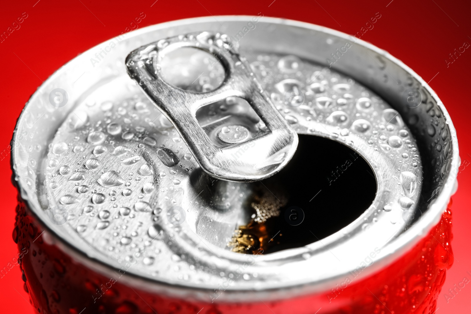 Photo of Wet open can with cold drink, closeup