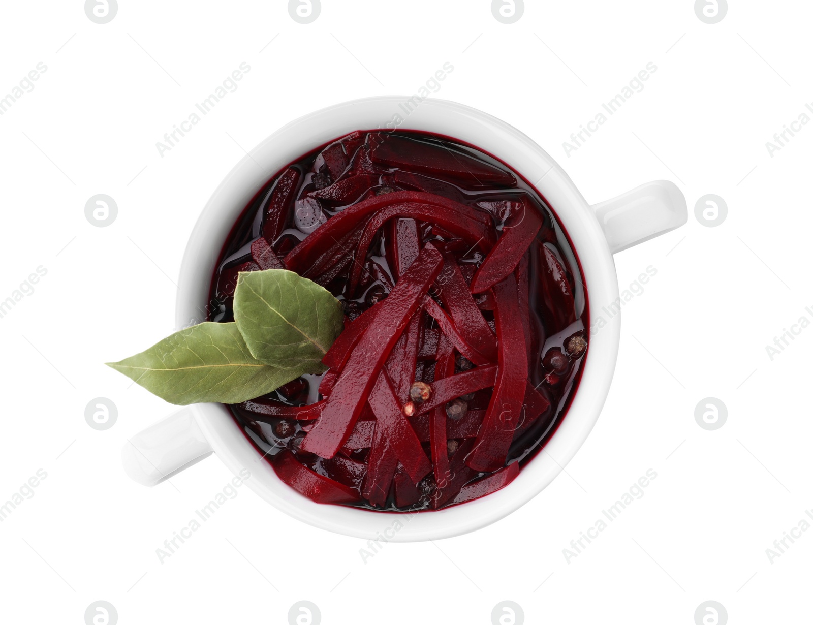 Photo of Pickled beets in bowl isolated on white, top view