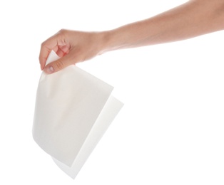 Photo of Woman holding paper napkin on white background, closeup