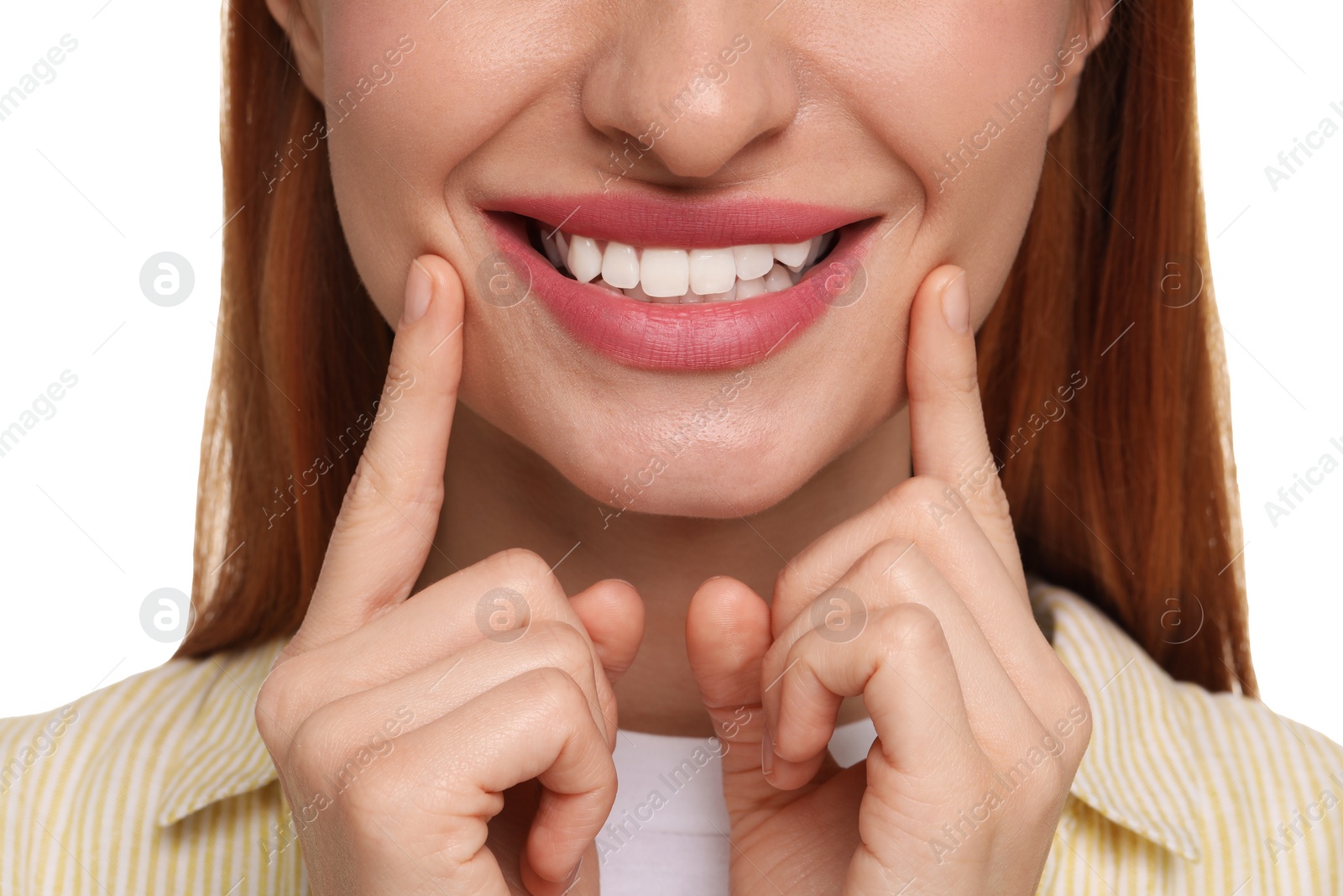 Photo of Woman showing her clean teeth and smiling on white background, closeup