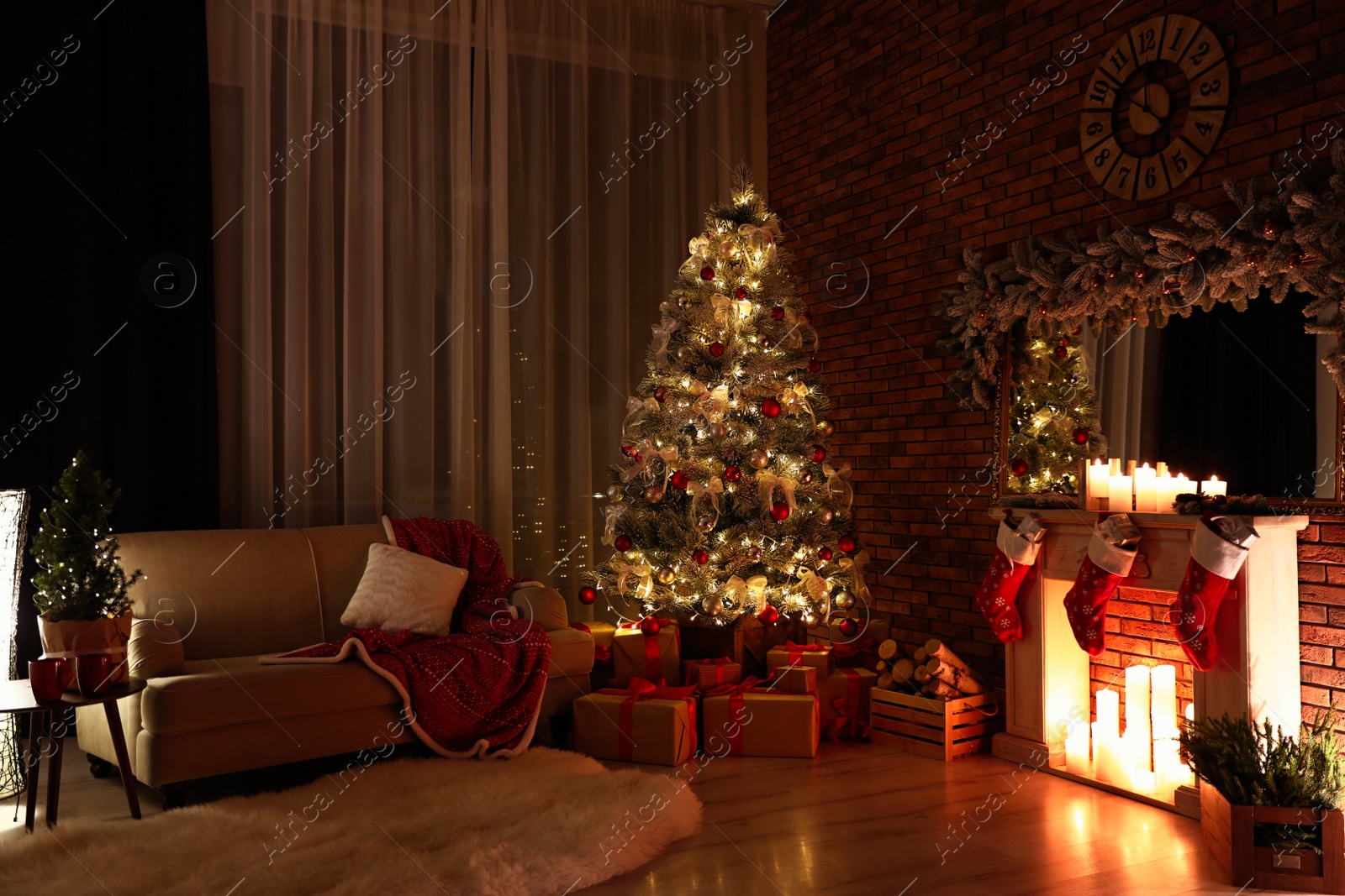 Photo of Stylish room interior with beautiful Christmas tree in evening