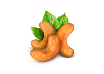 Image of Tasty cashew nuts and fresh green leaves on white background 