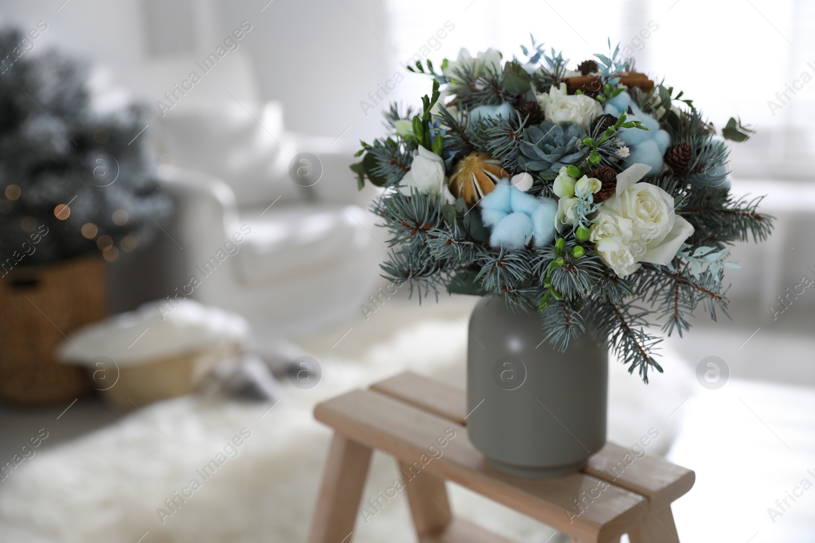 Photo of Beautiful wedding winter bouquet on wooden rack indoors. Space for text