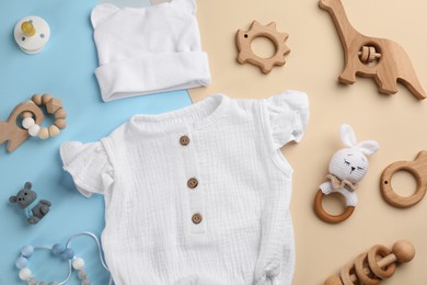 Photo of Flat lay composition with baby clothes and accessories on color background