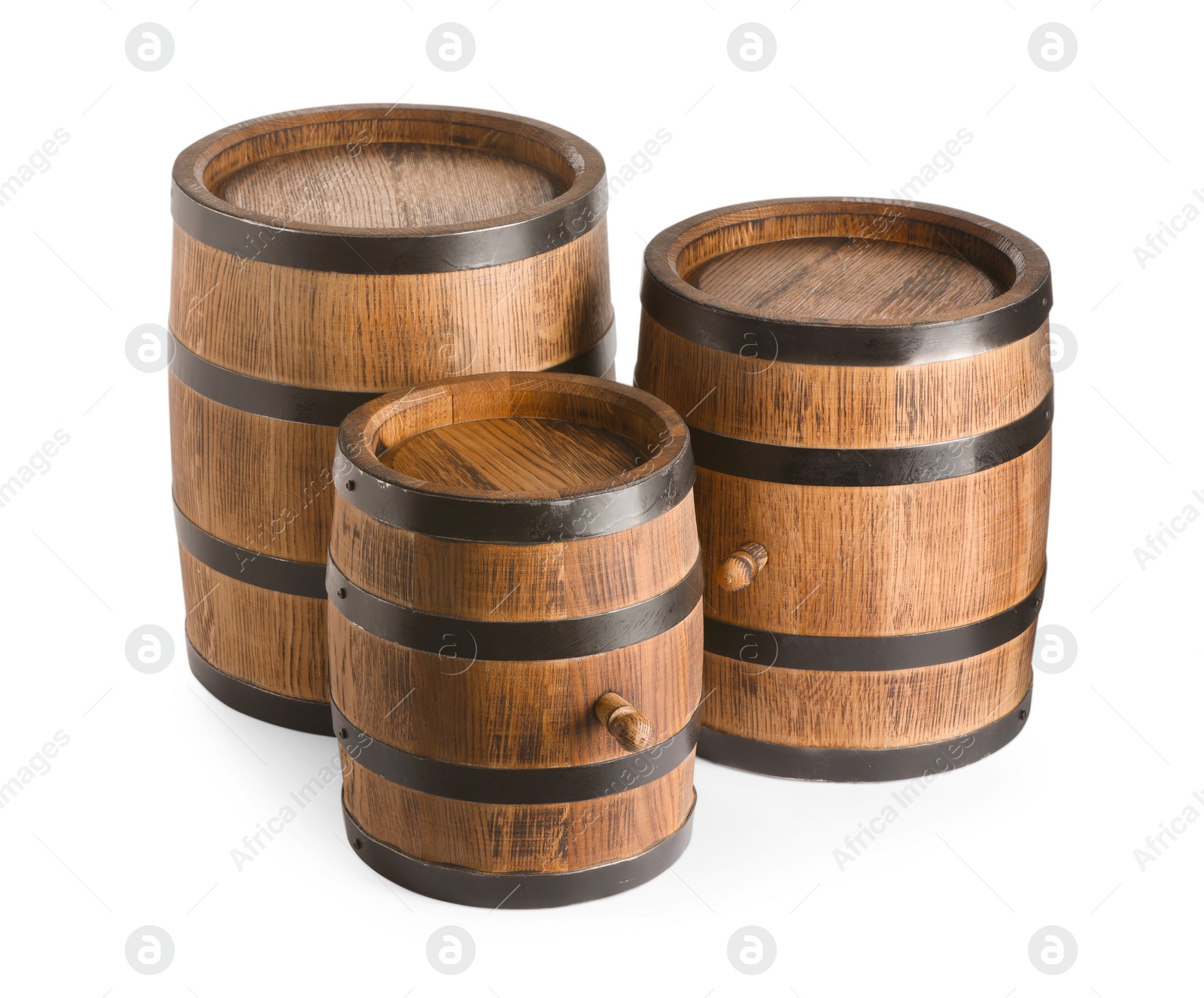 Photo of Three traditional wooden barrels on white background