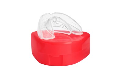 Transparent dental mouth guard and container on white background. Bite correction
