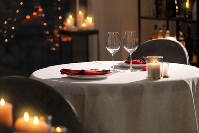 Photo of Table setting for romantic dinner in restaurant