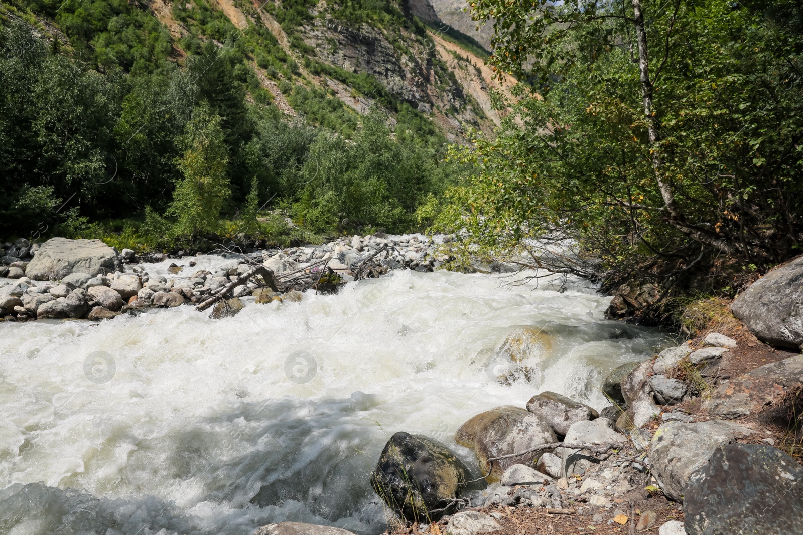 Photo of Closeup view of river stream in mountains