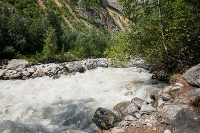 Photo of Closeup view of river stream in mountains