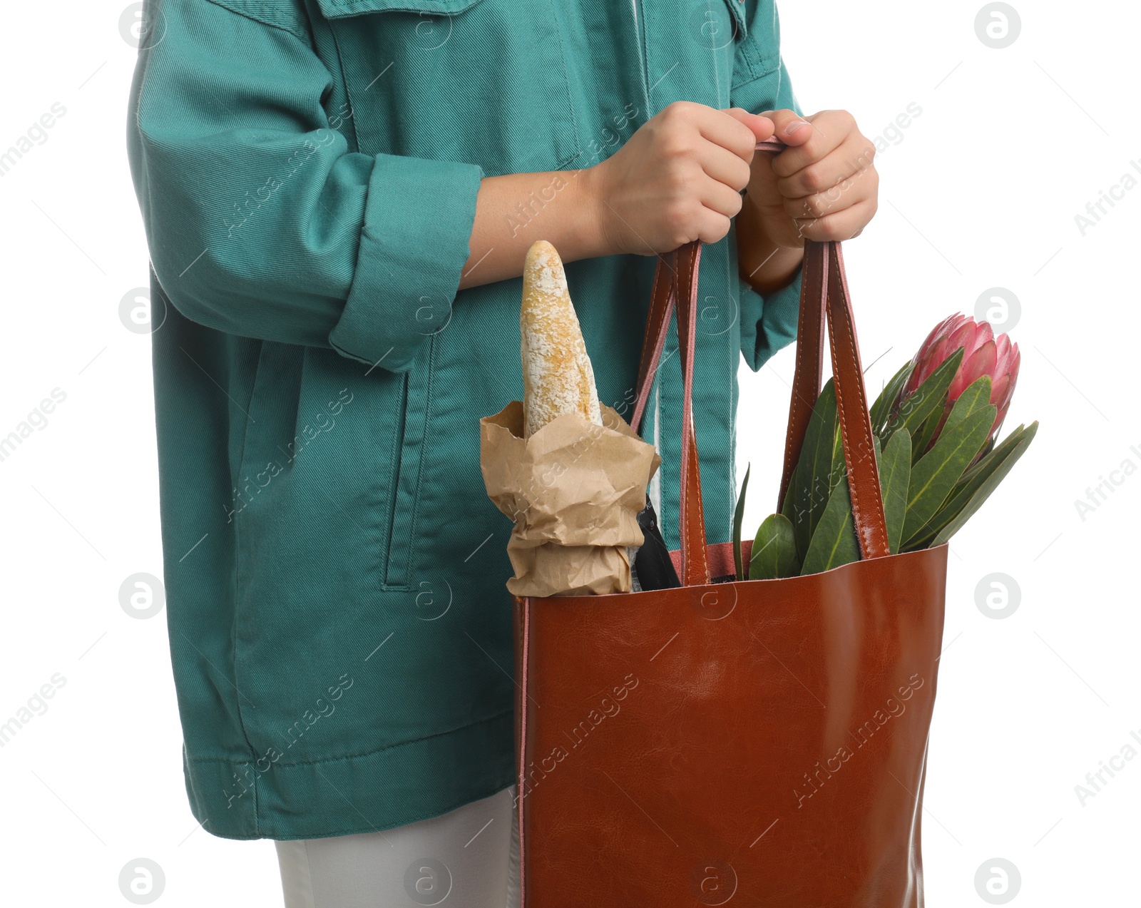 Photo of Woman holding leather shopper bag on white background, closeup