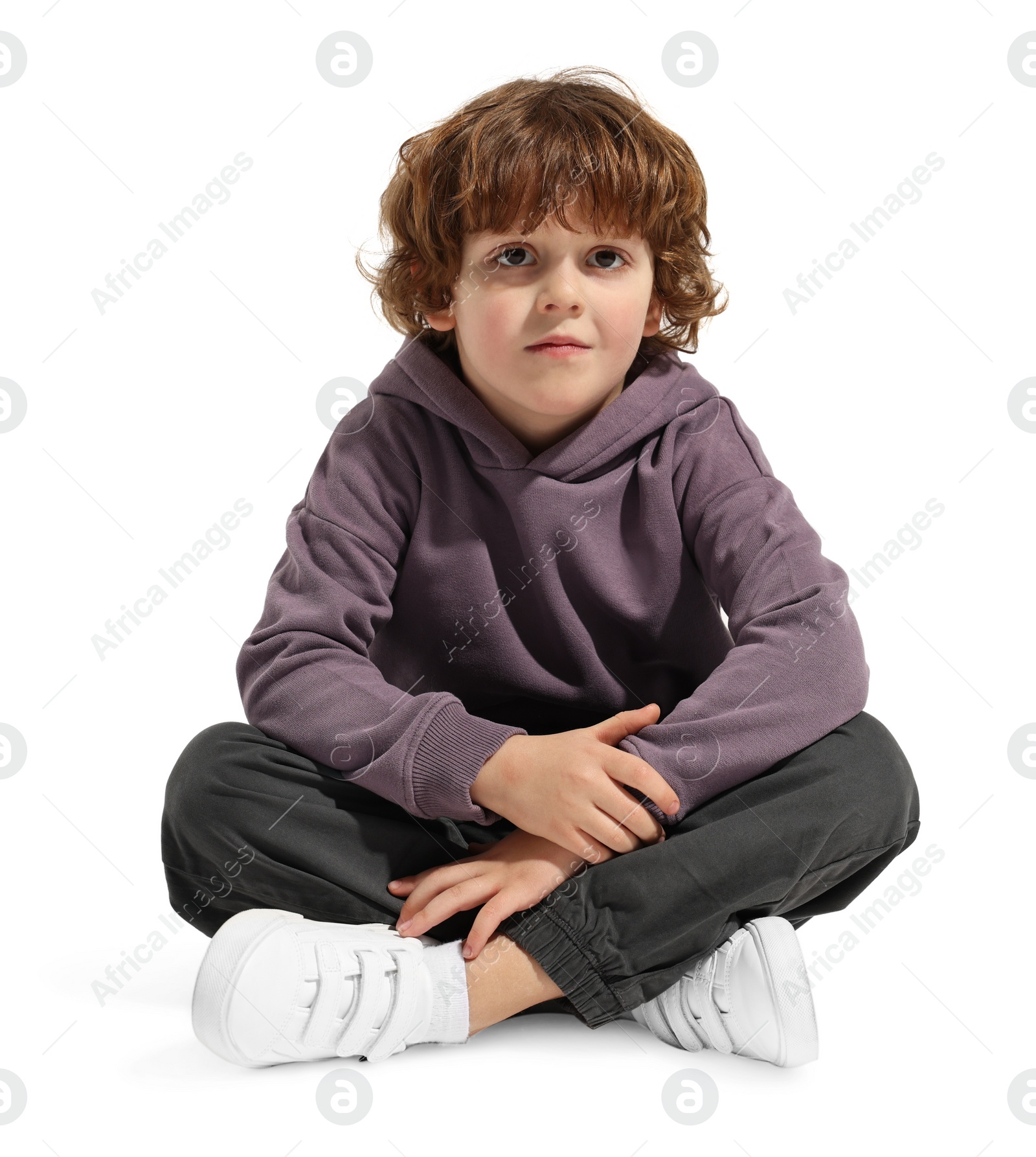 Photo of Fashion concept. Stylish boy posing on white background