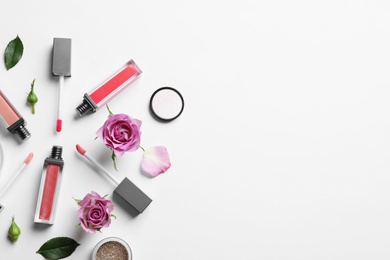 Photo of Composition with lipsticks on white background, flat lay. Space for text