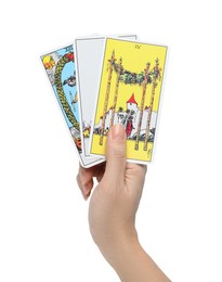 Photo of Woman holding tarot cards on white background, closeup